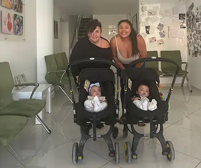 Smiling-female-couple-with-babies-after-artificial-insemination Smiling-female-couple-with-babies-after-artificial-insemination